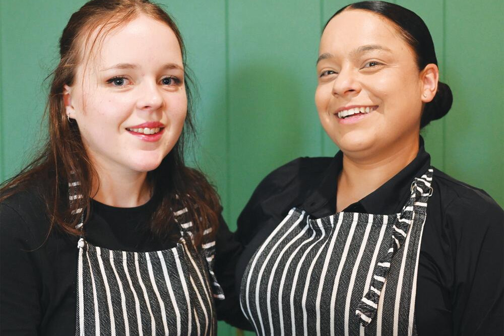 Ella Bailey (left) is congratulated by Charleern Cooper after Ella was named college dux. LH PHOTO