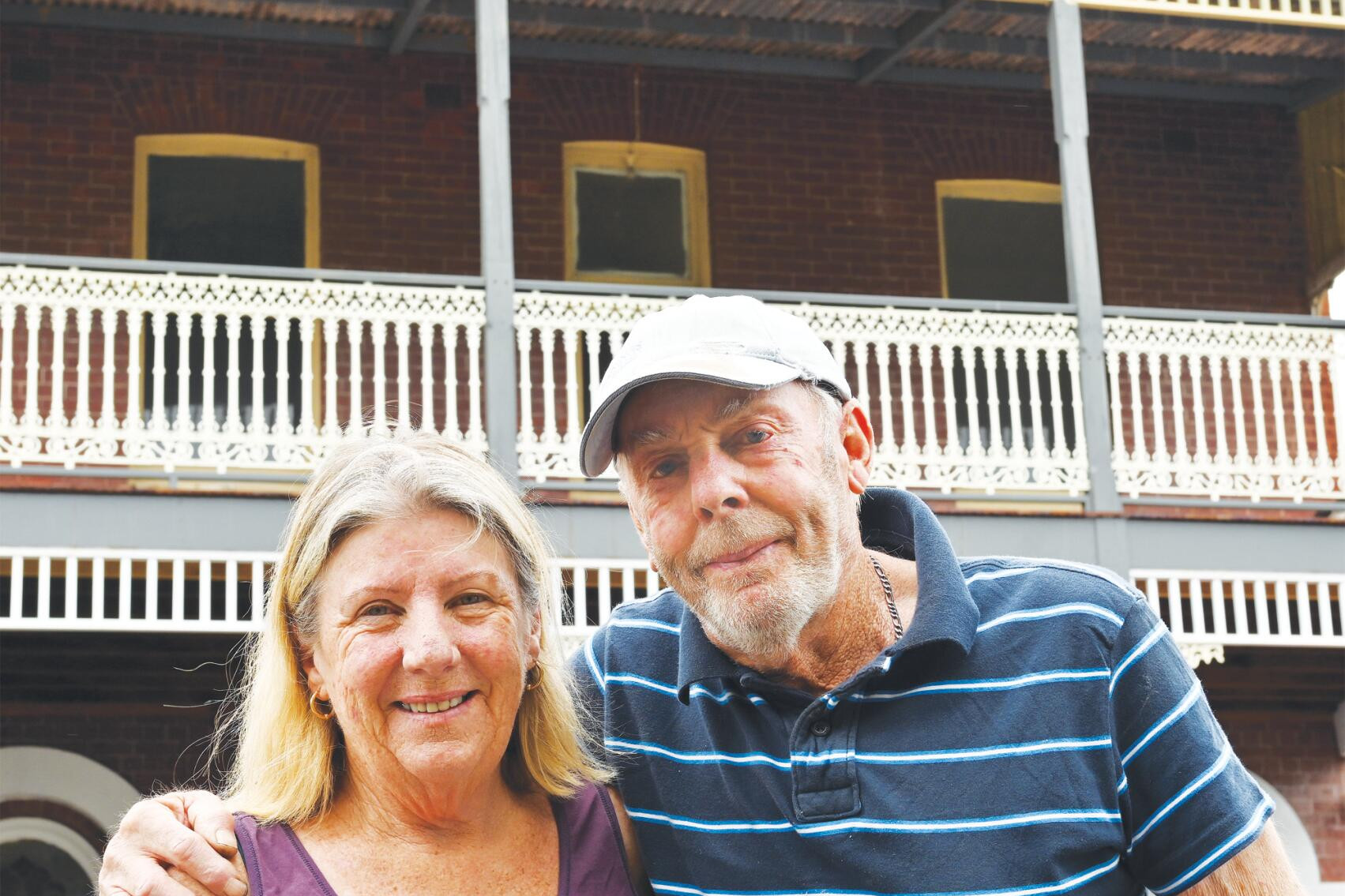 Debbie and Barry Pitman in front of the restored Pelican Hotel verandah. LH PHOTO