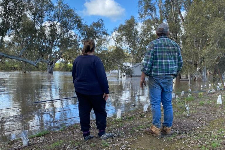 Sonya and Neil James survey their flooded property last October