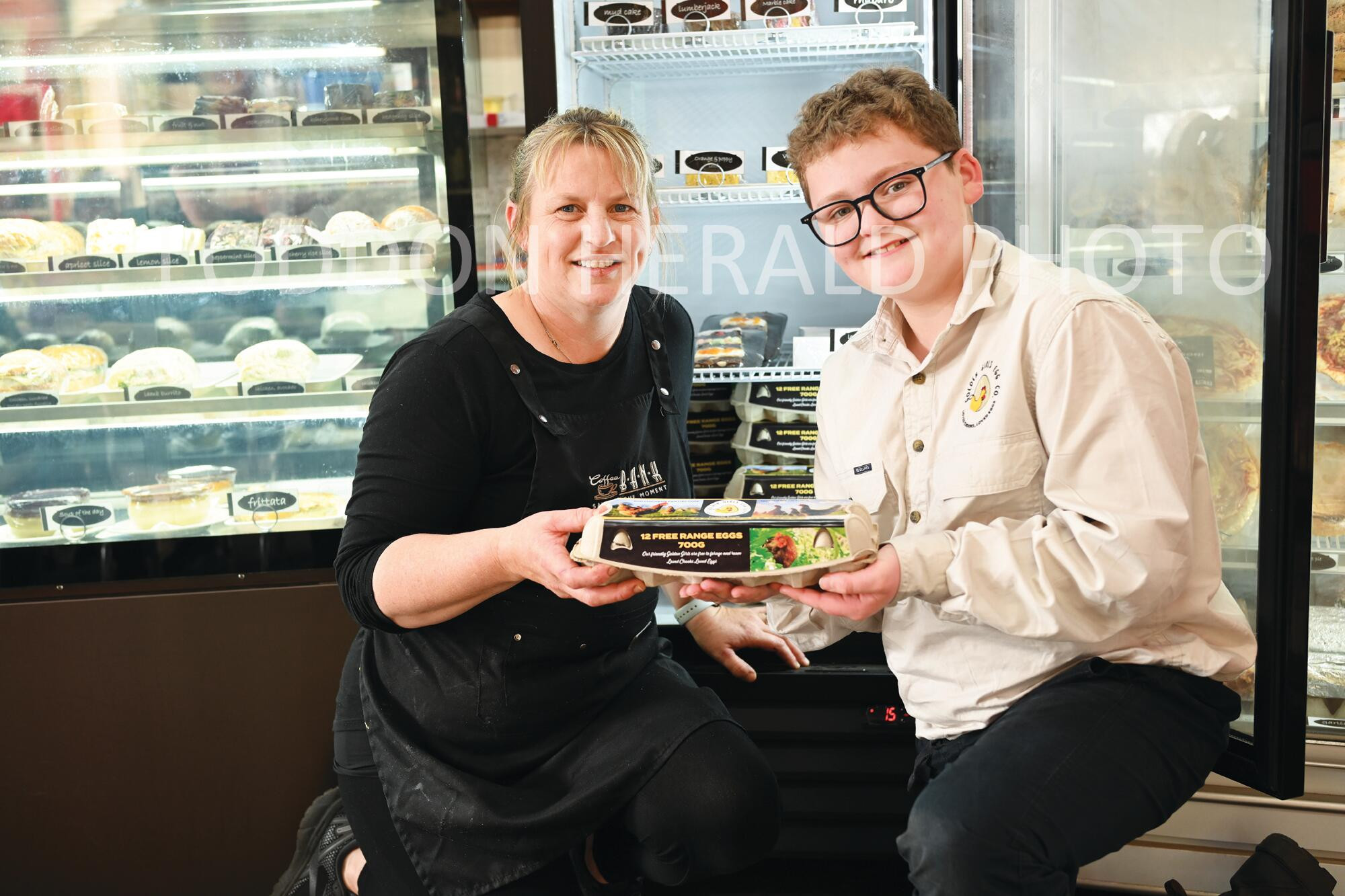 Pyramid Hill Coffee Bank's Deb Forster takes delivery of her weekly supplies from Campbell Harcourt