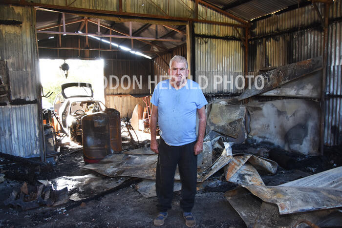Shed fire flames lick home - feature photo