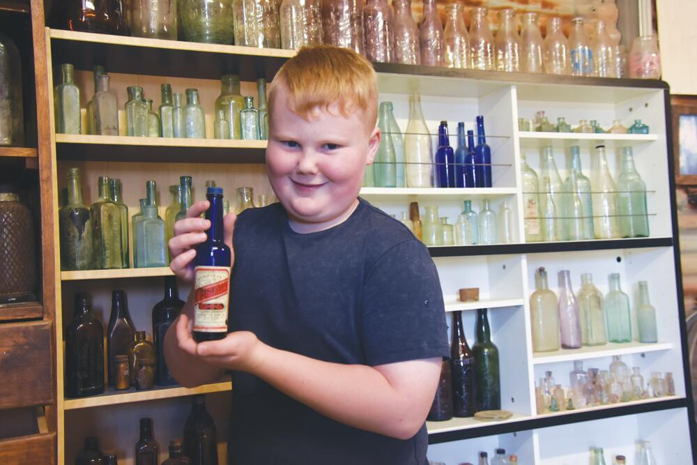 Green bottles on wall - feature photo