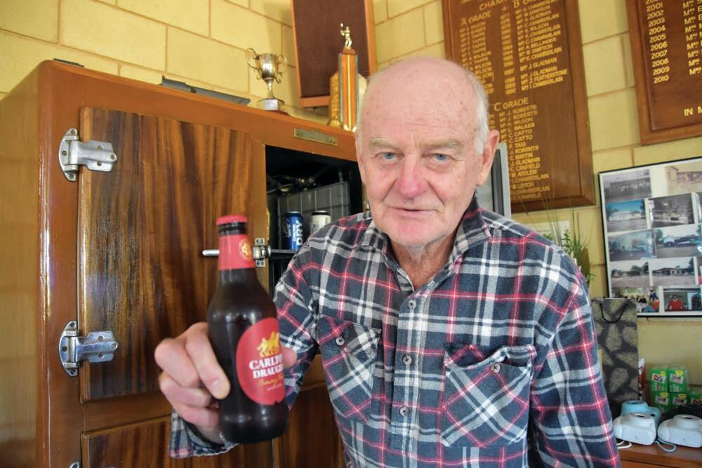 Classic putt beer in fridge case - feature photo