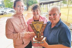 Raining premiers keep title - feature photo