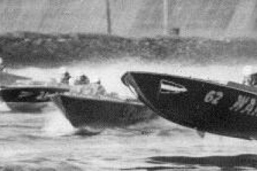 Putting skis on lake - feature photo