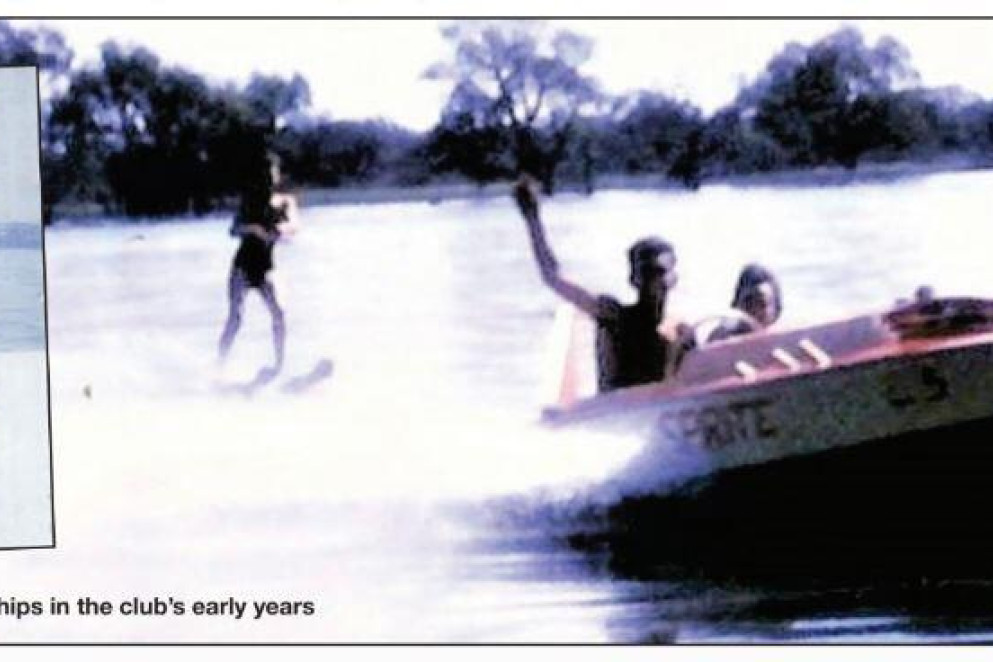 Putting skis on lake - feature photo