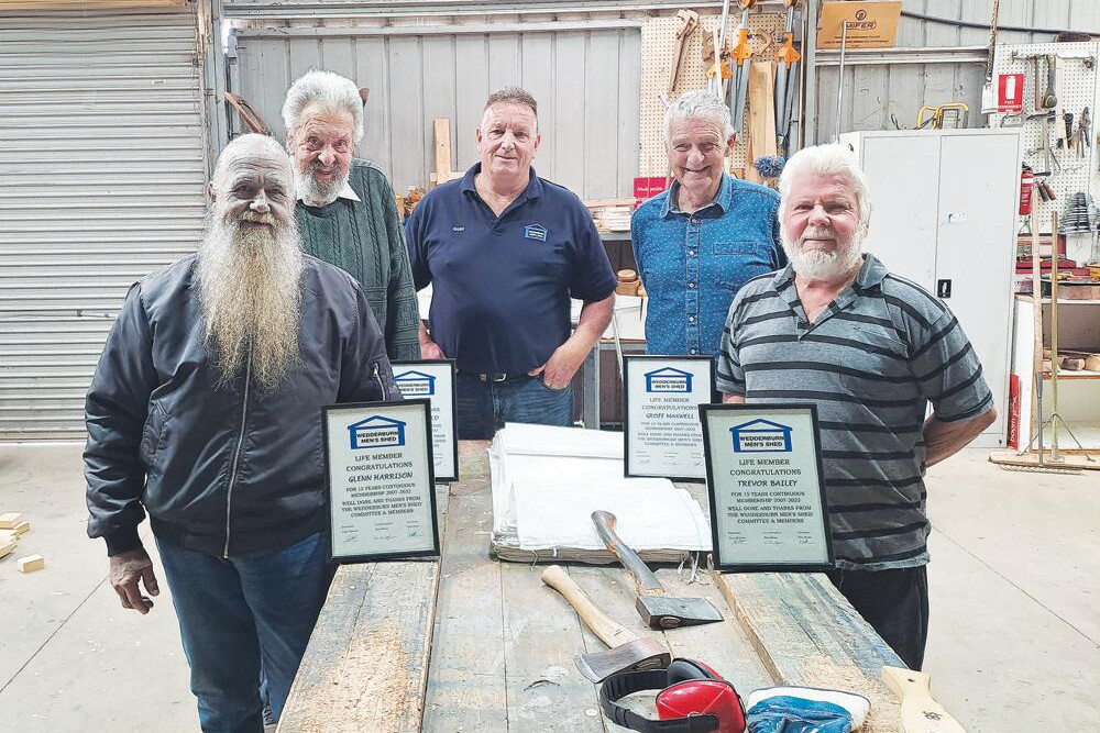 Glenn Harrison, Frank Canfield, Gary Roberts, Geoff Maxwell and Trevor Bailey celebrate at the Men’s Shed. LH PHOTO
