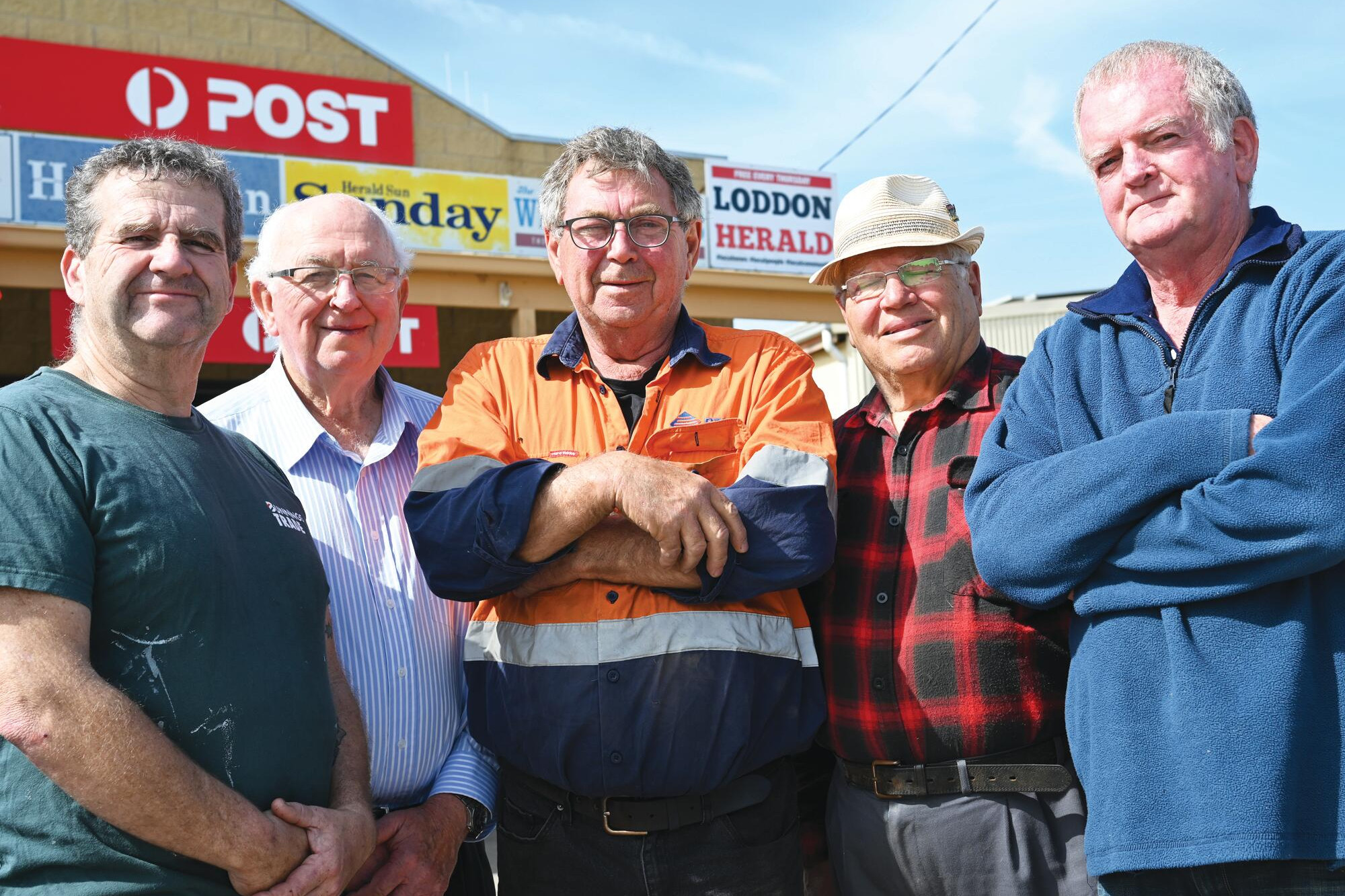 Matty Down, Terry Wood, Trevor McIntosh, Fred Belli and Michael O’Rourke after erecting the Loddon Herald sign
