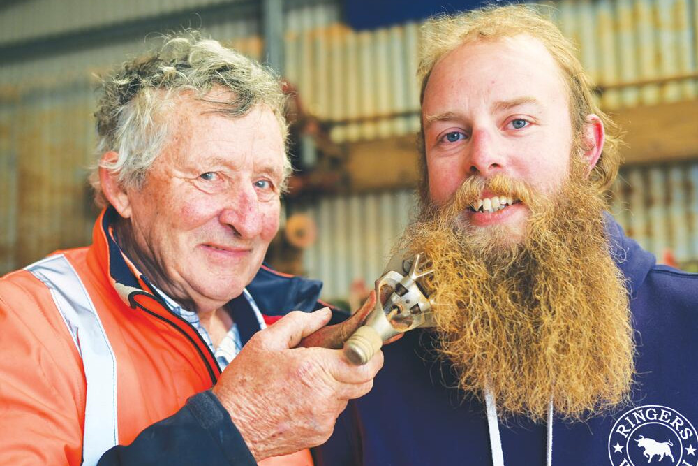 Barry Finch and Tom Chalmers try out the old shears. LH PHOTO