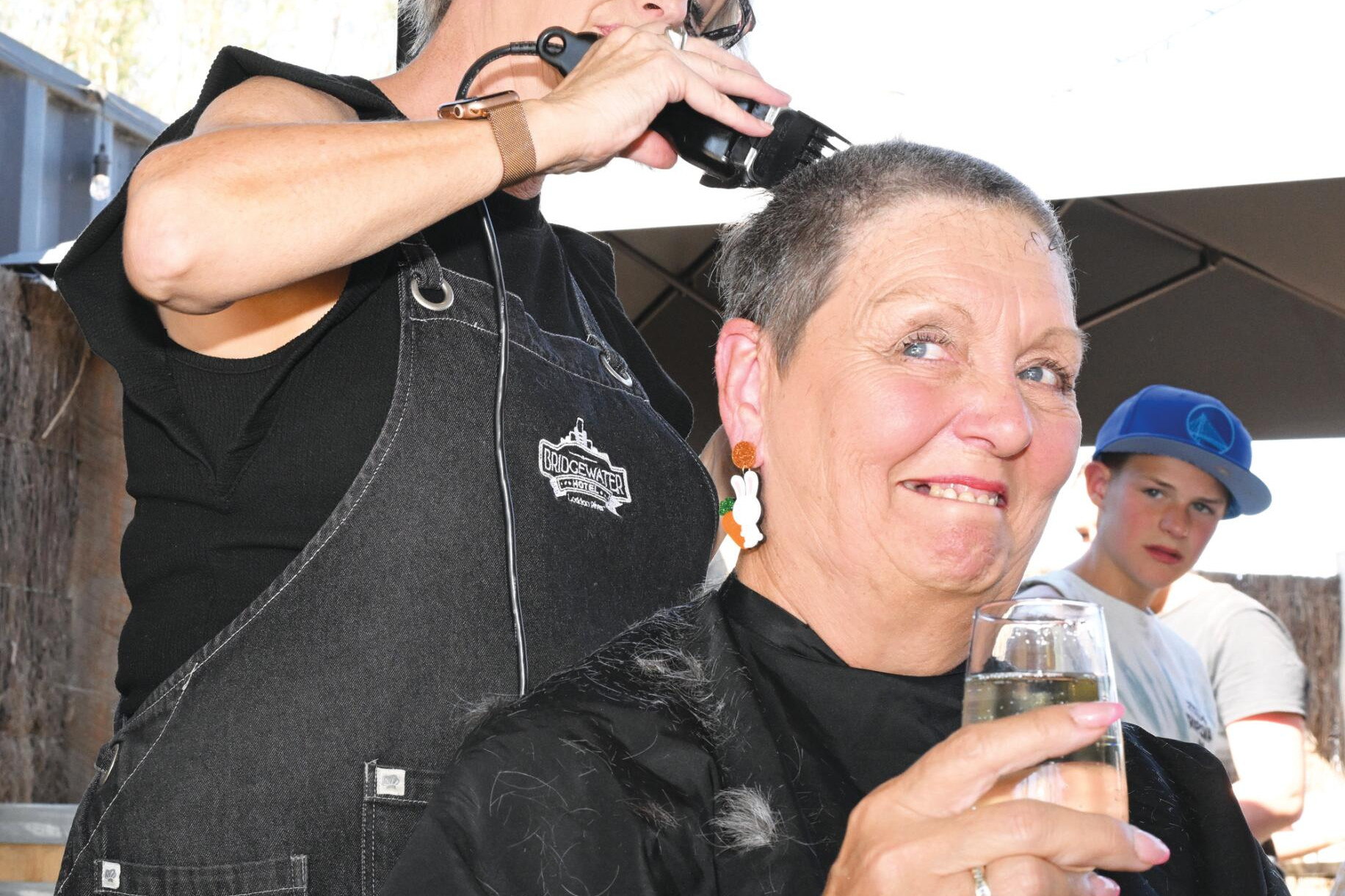 Janey's close shave helps the kids - feature photo