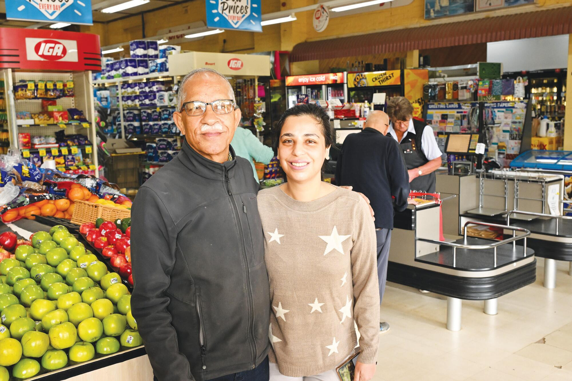 Dalip Chawla and daughter Mansi begin saying farewells at the Boort supermarket. LH PHOTO