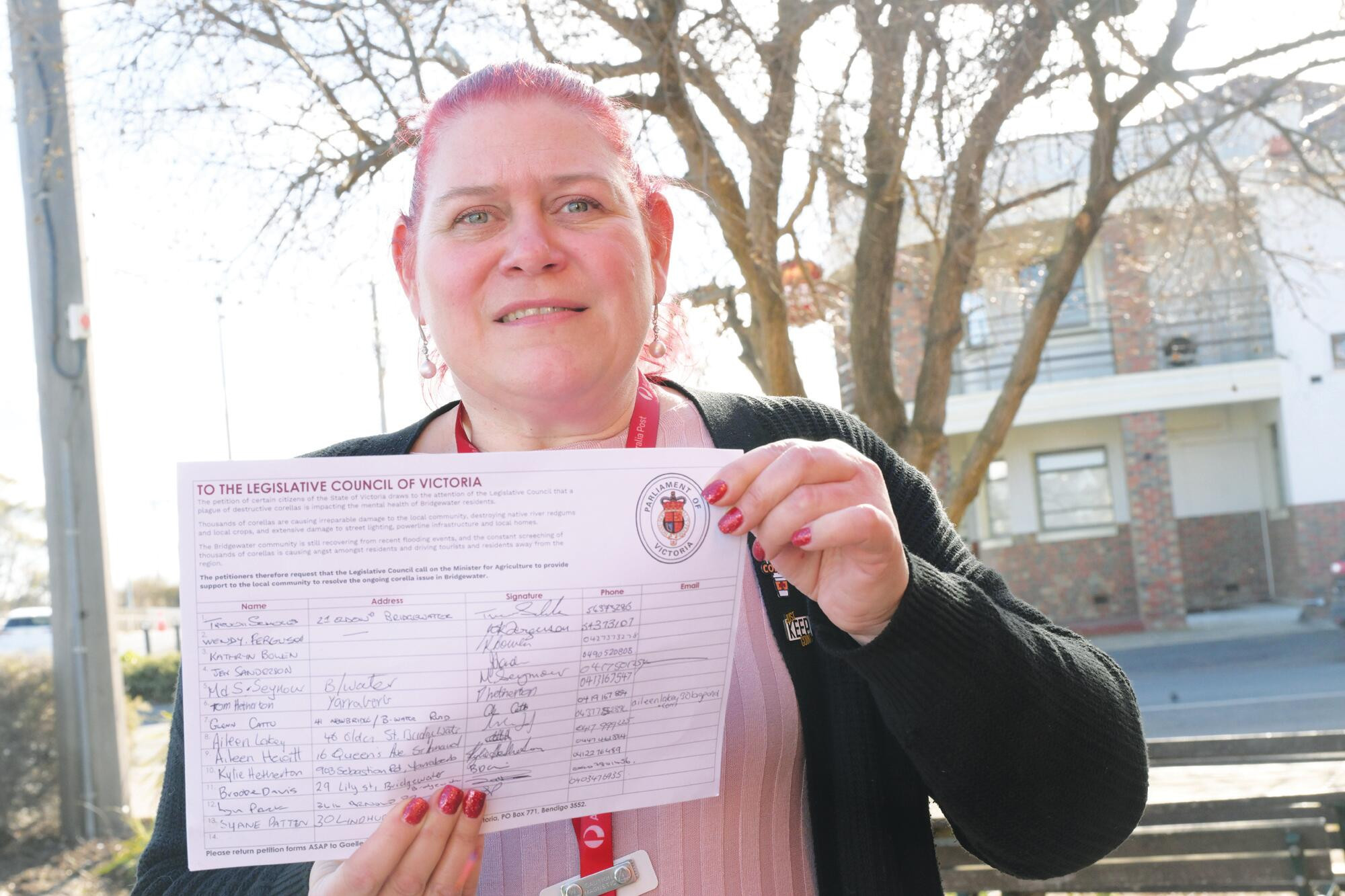 Jenny Sanderson collects petition signatures