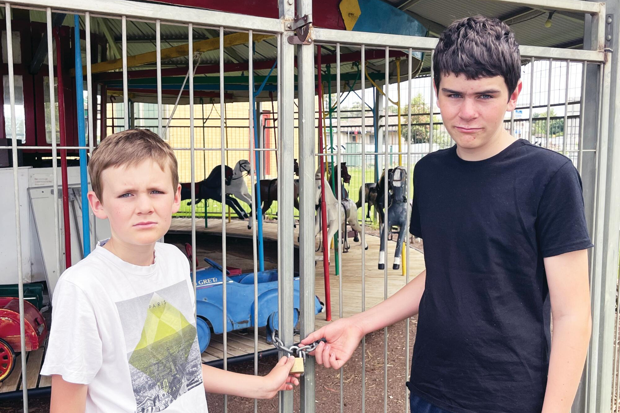 Merry-not-go-round ... William and Jonas Haw unhappy the famous ride will not run over summer