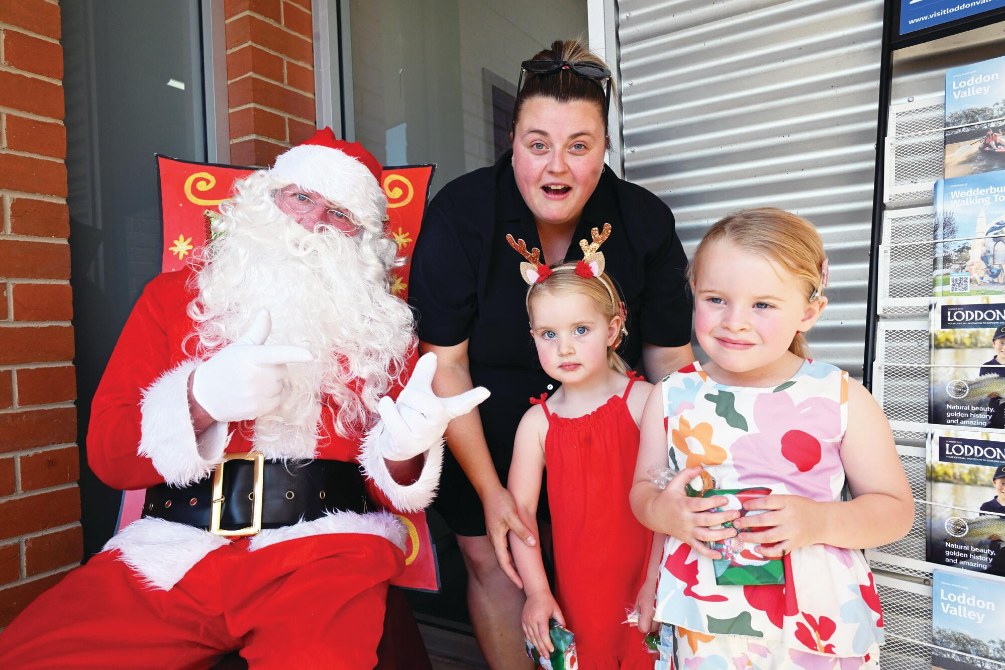 Santa with Georgia, Emmie and Bec Chalmers. LH PHOTOS