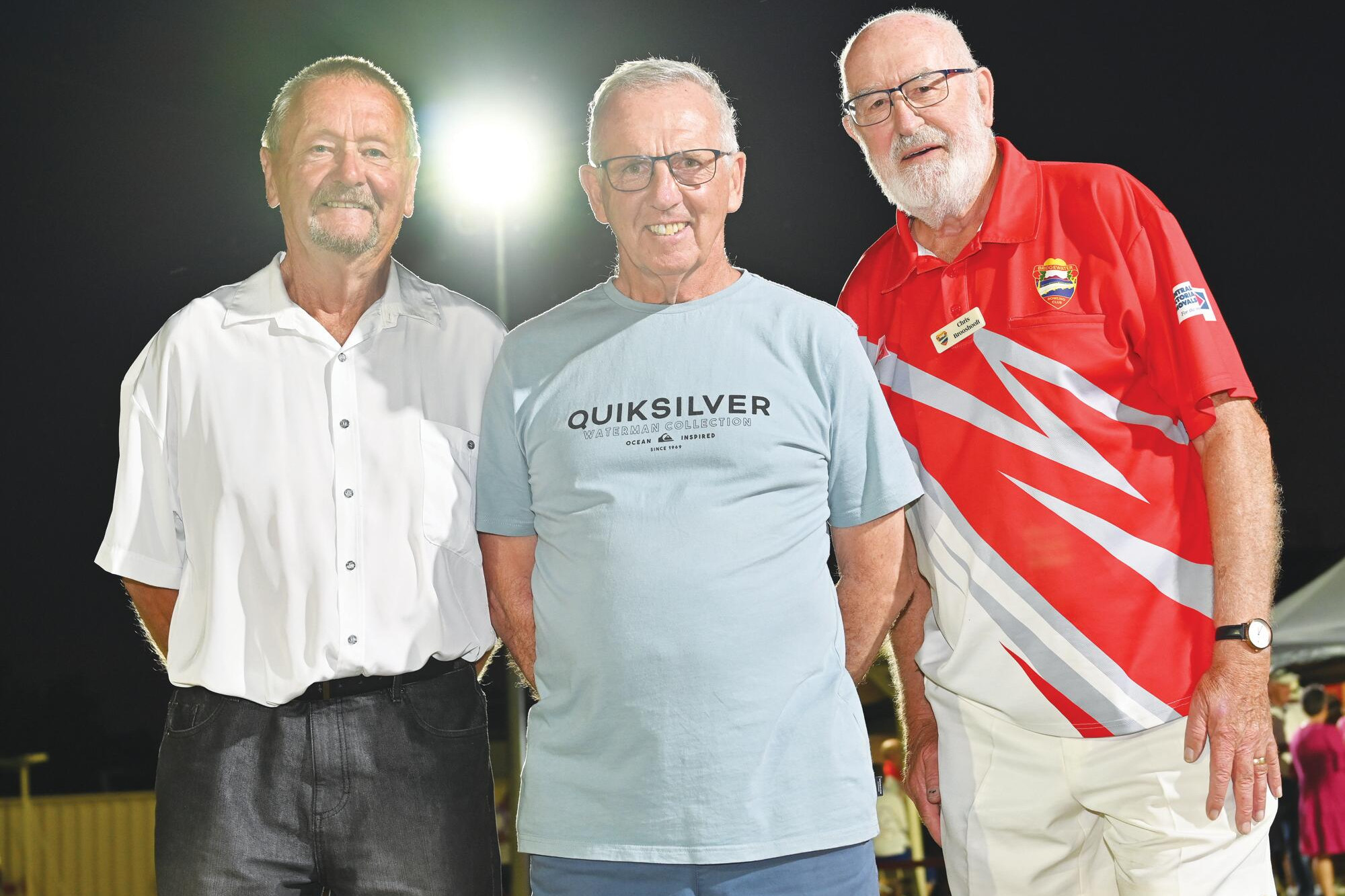 Mayor Gavan Holt, tournament director Ian Clutton and club president Chris Brooshooft after the lights are turned on. LH PHOTO