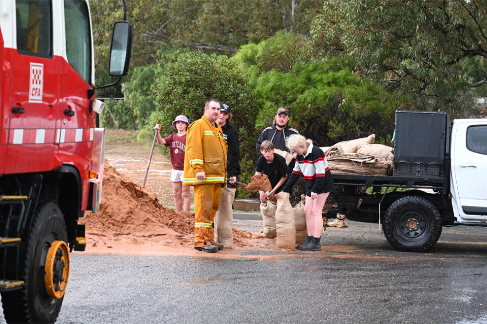 Sandbagging on banks of creek
