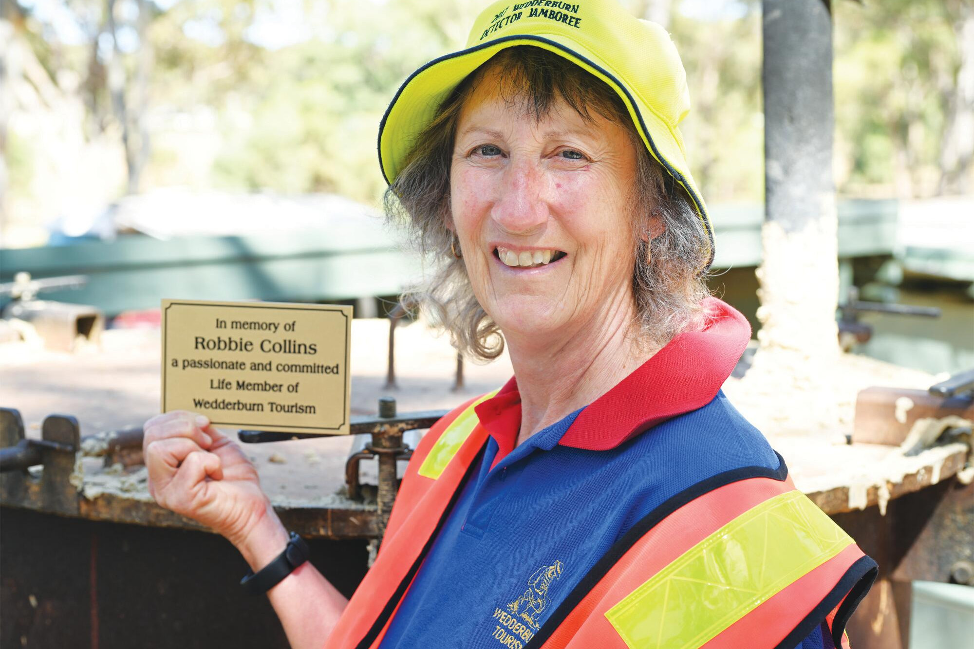 Robbie Collins’ daughter Robyn Vella with the special plaque