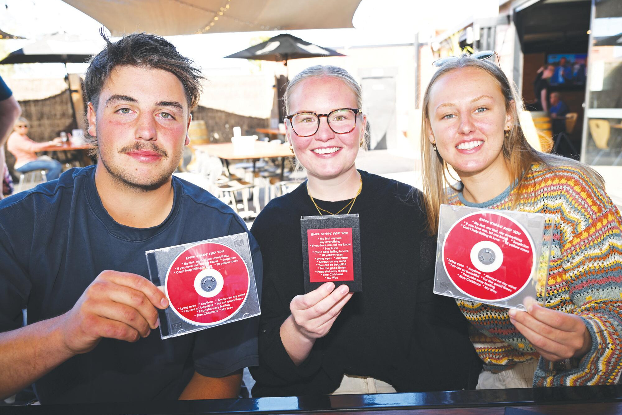 Matt Rowe, Ella Rowe and Marcey Martin support Enzo's fundraising