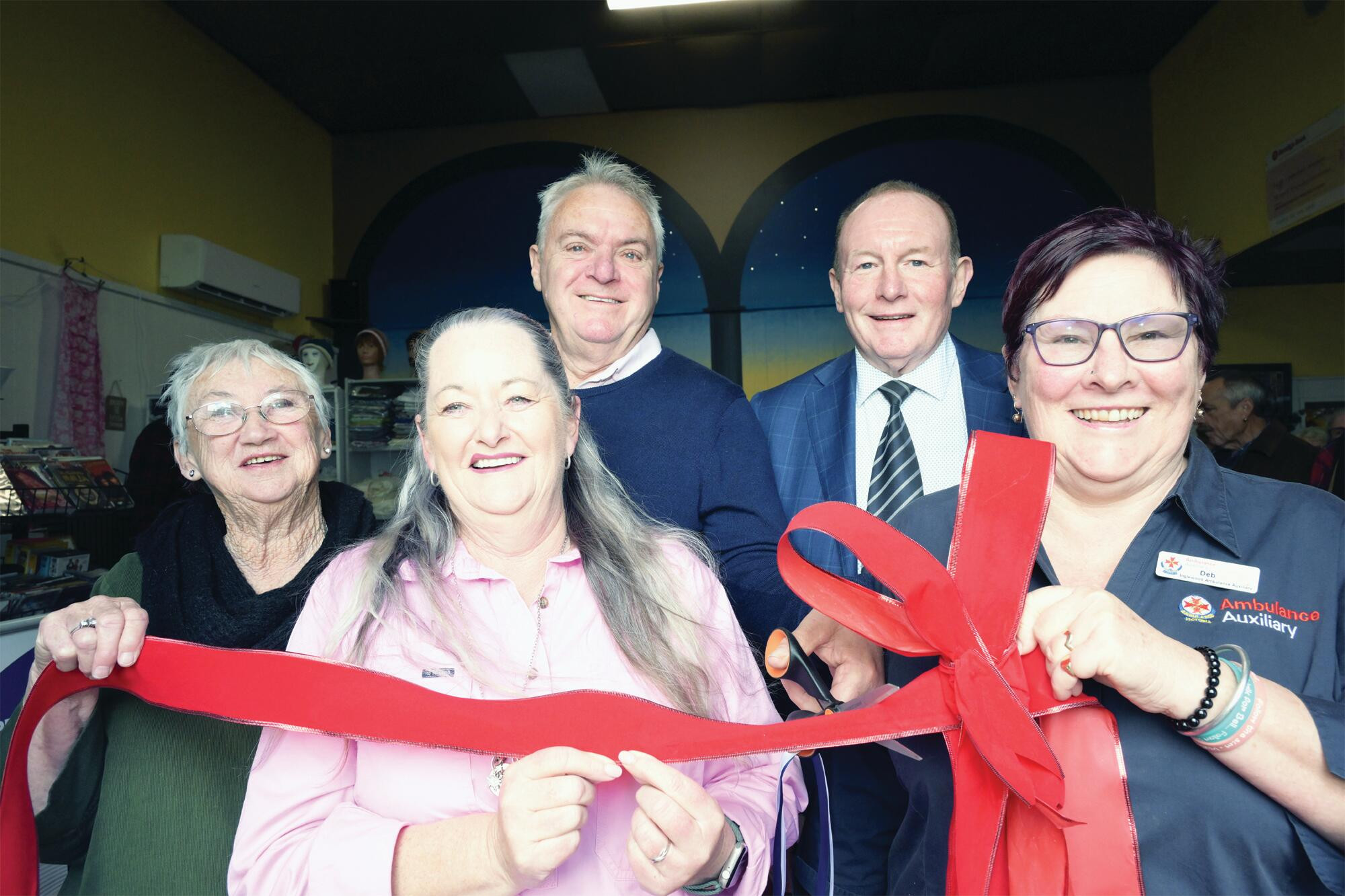 Op-shop opens with cake and ribbon - feature photo
