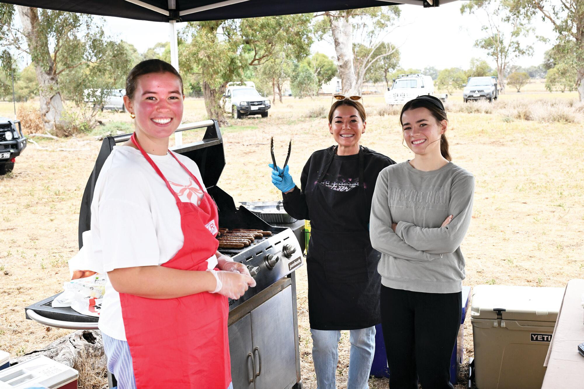 Jamieson Brown with Ivy and Dimity McCann raising funds for Timor Lieste. LH PHOTO