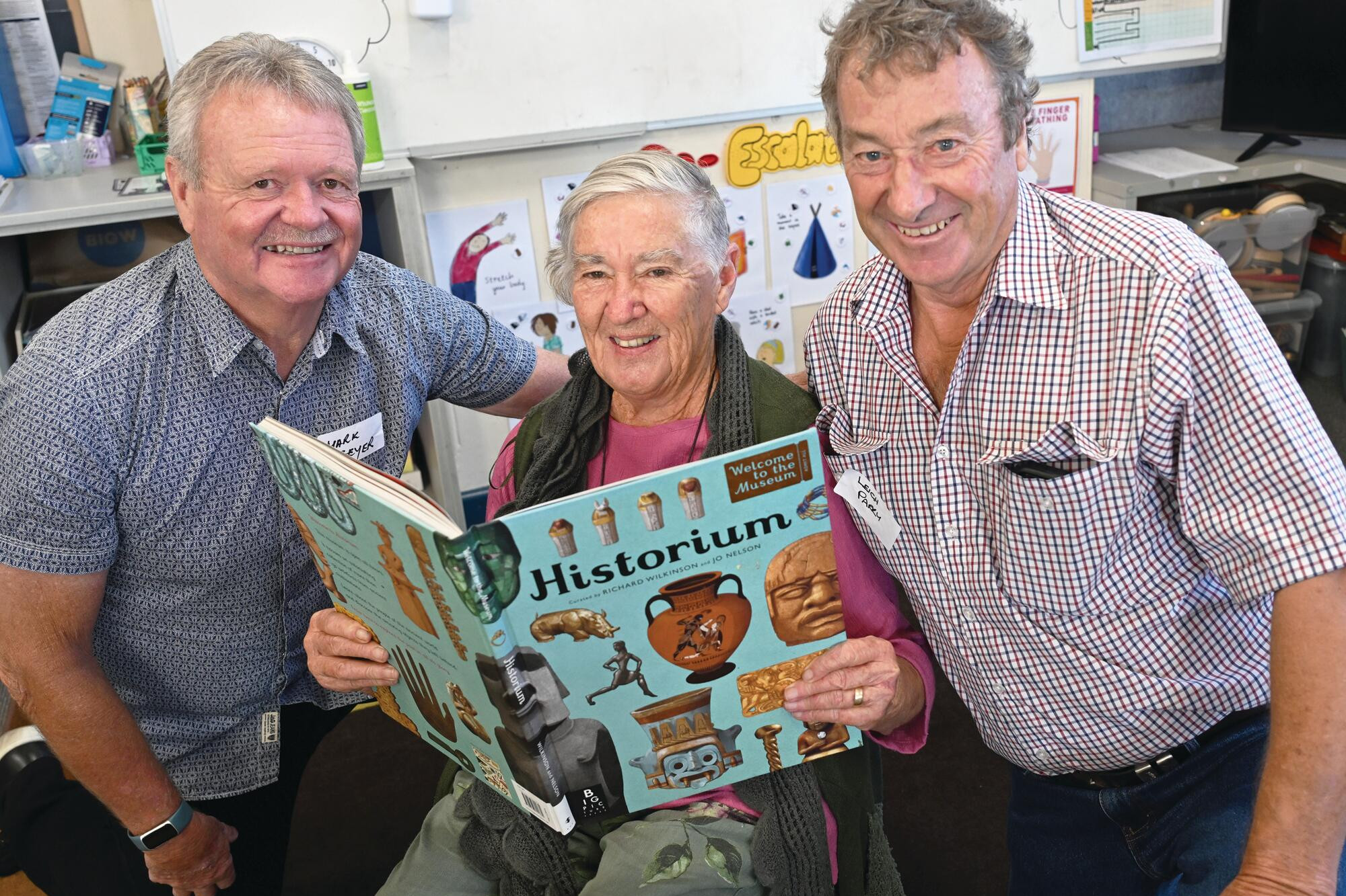 Mark Geyer (left) and Leigh Parry back in their old classroom with with Grade 3-4 teacher Jean McClymont. LH PHOTO