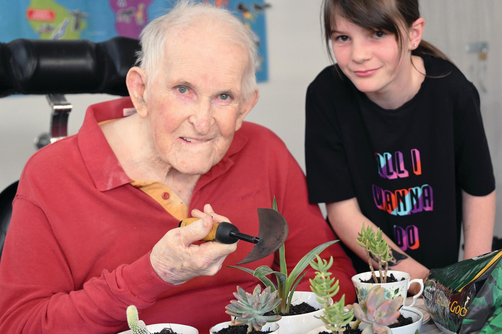 Ian Jackson and Emily Canham were busy potting cacti on Saturday. LH PHOTO