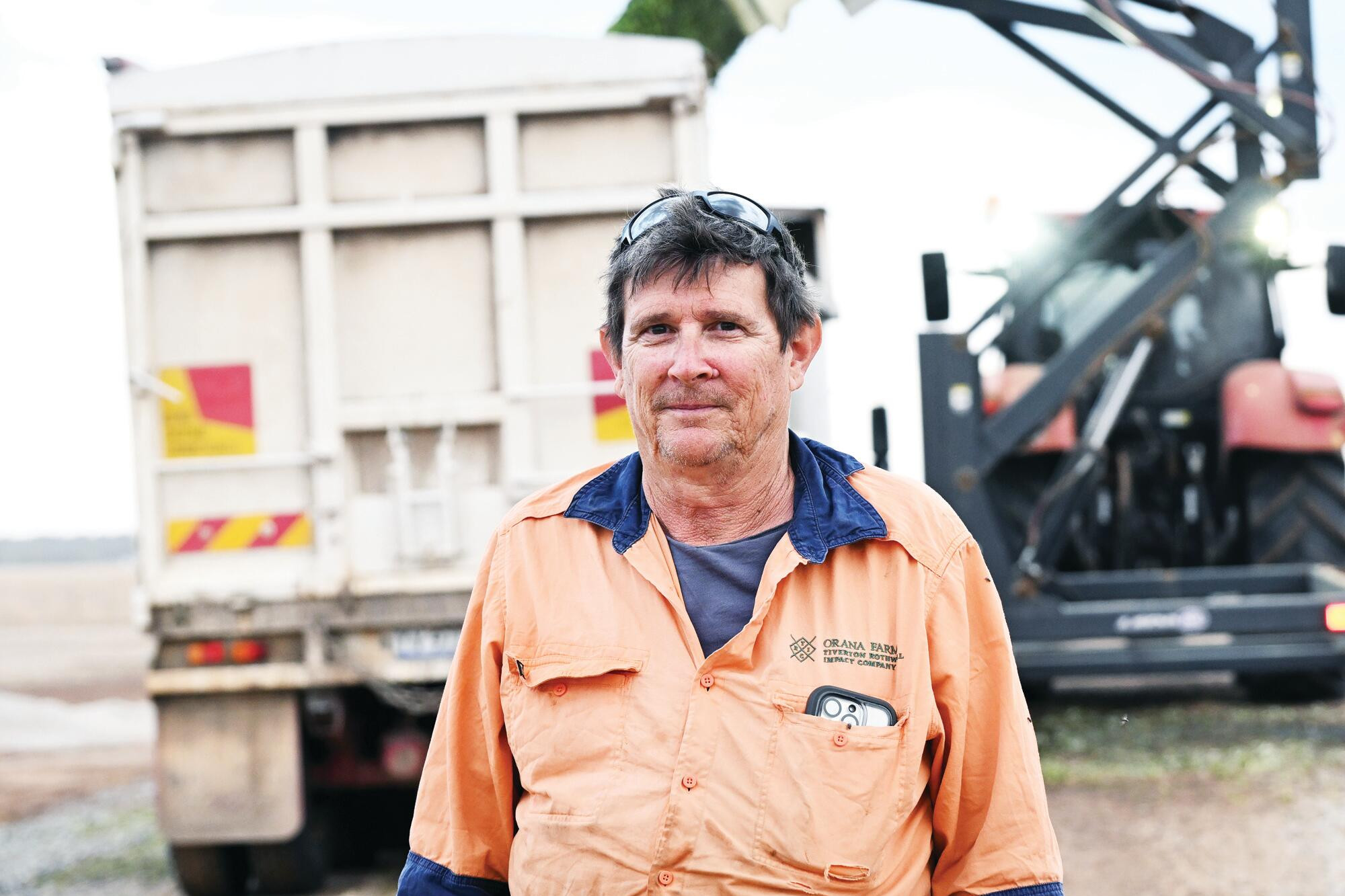 Grove manager Dale Stelfox checks on harvest progress. LH PHOTO