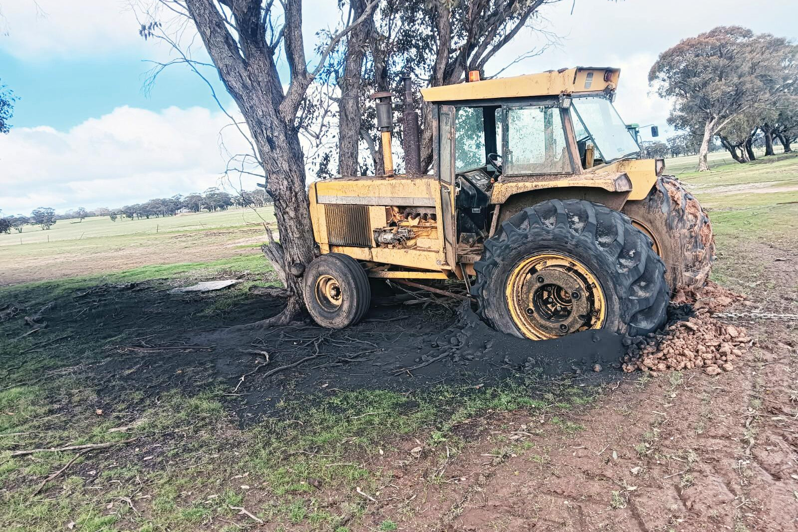Tractor stolen from farm and used to free bogged vehicle, engine left running, crash into tree