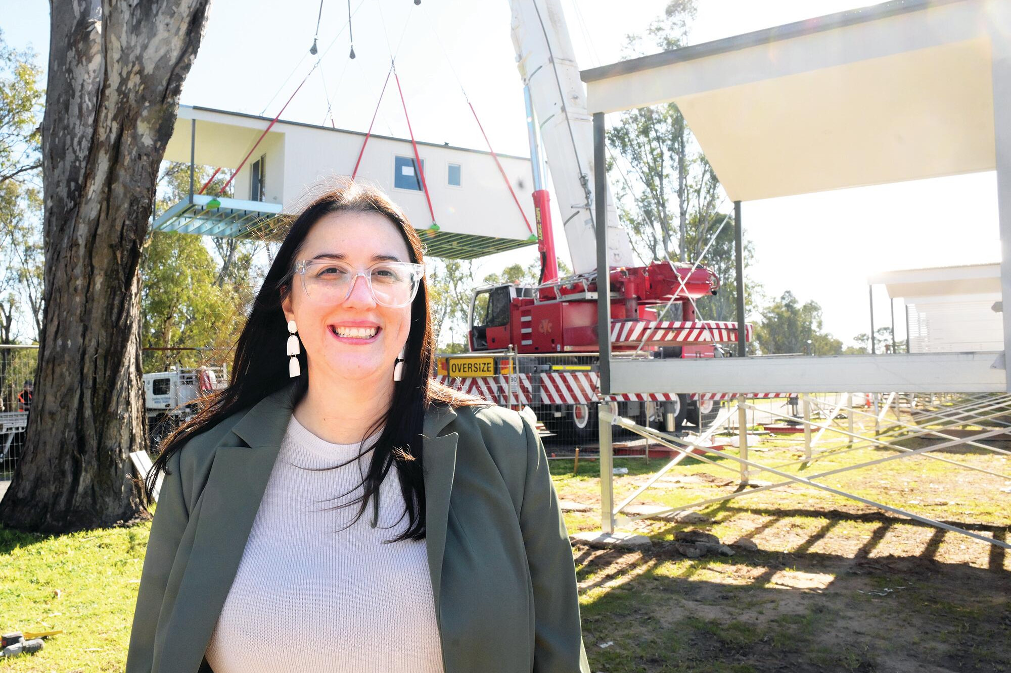 CDLS Homes’ Stacey Gazzolo at Bridgewater Caravan Park as new cabins are lowered into position. LH PHOTO