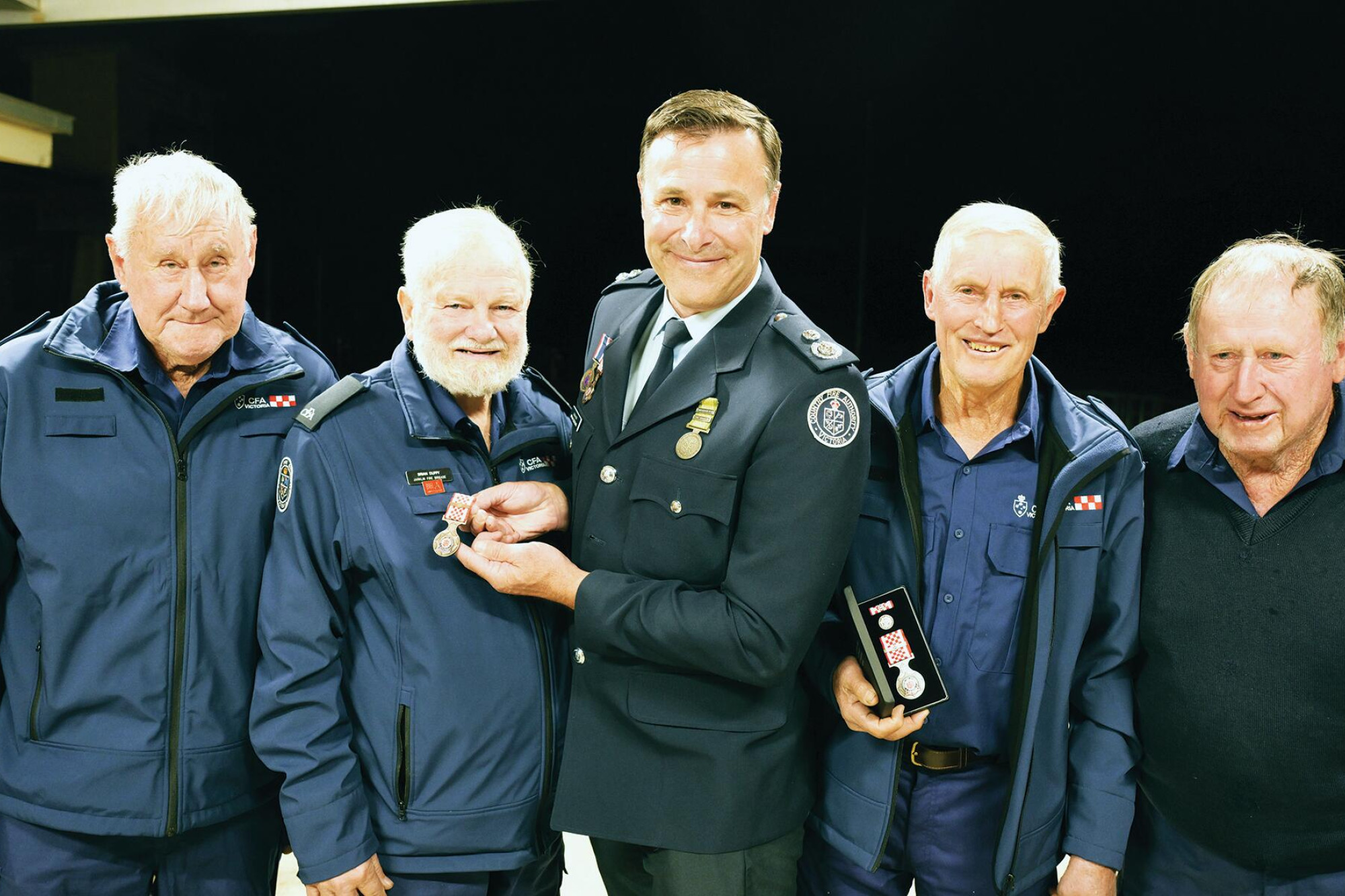 Life members Barry Meighan, Brian Duffy, Graham Maxted and Peter Meighan with the CFA’s Bryan Suckling. LH PHOTOS