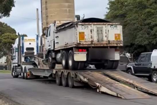 Officers seize a truck as part of investigations into reports of illegal logging at Tarnagulla