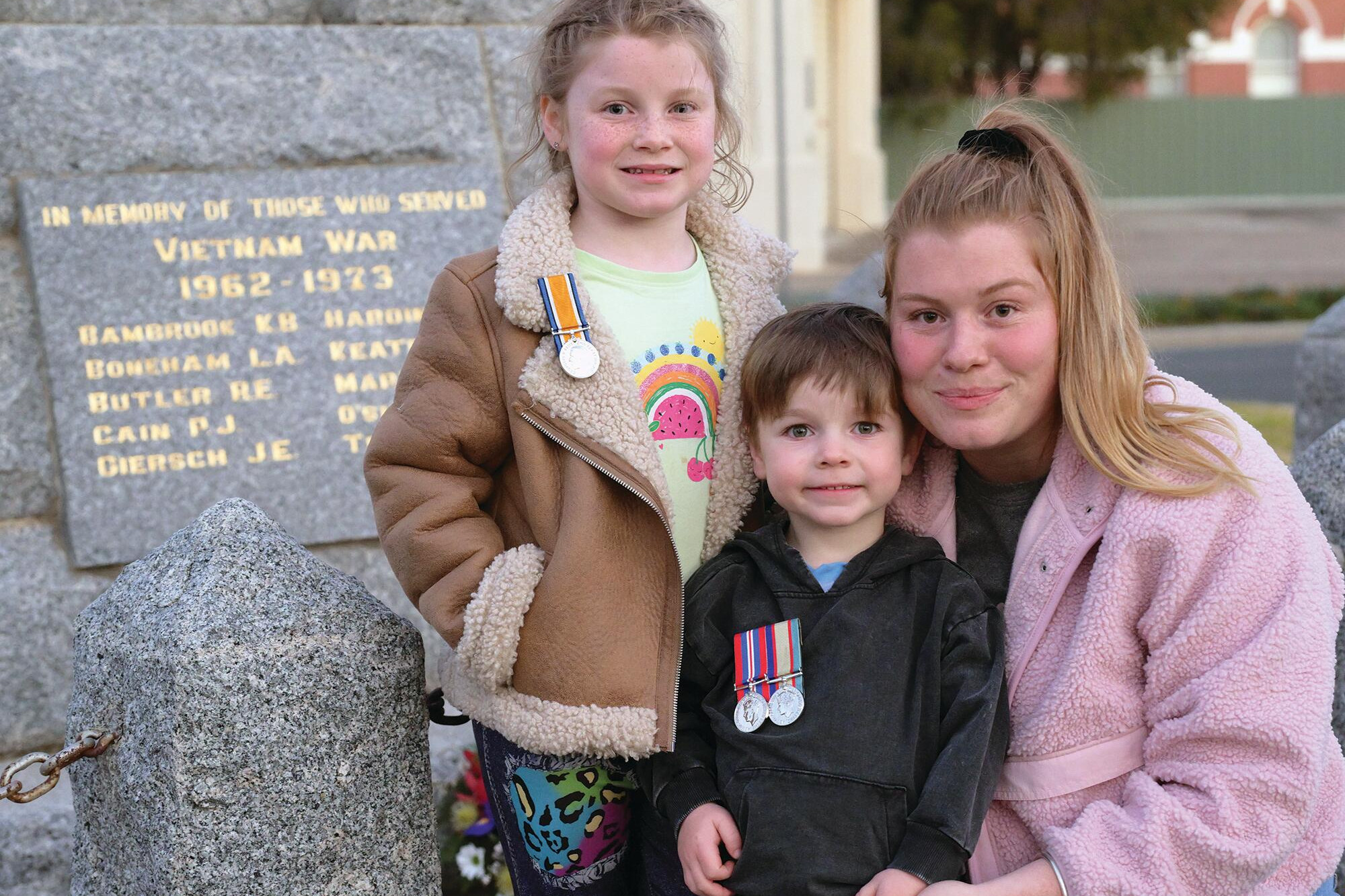 Layla, Kayden and Kate Warke at Monday’s commemoration service. LH PHOTO