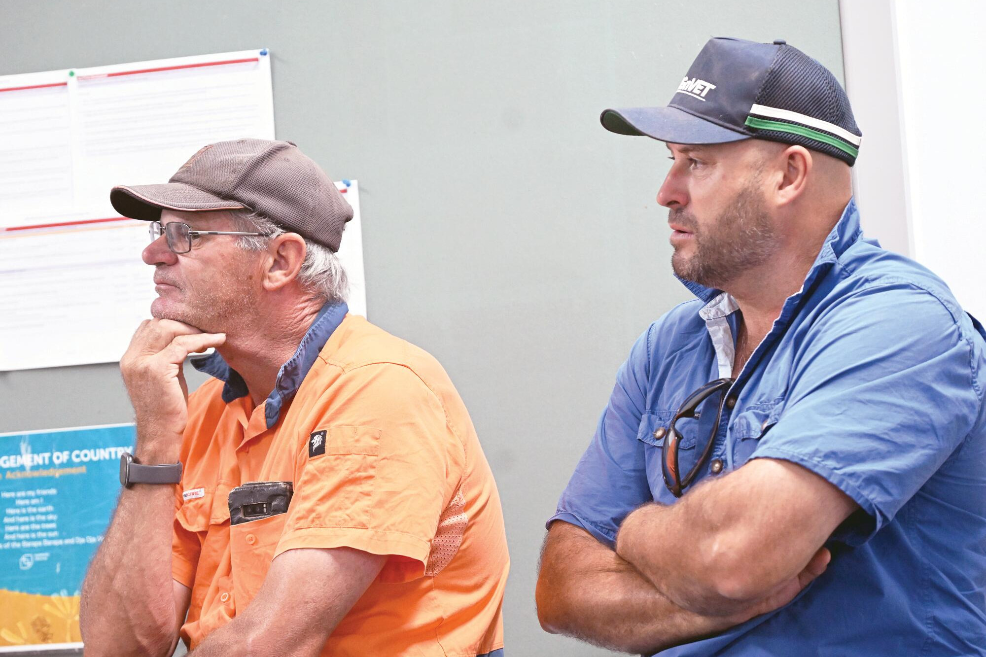Robert Moon and Wayne Maxted listen to the presentation on potential irrigation water rationing by GMW. LH PHOTOS