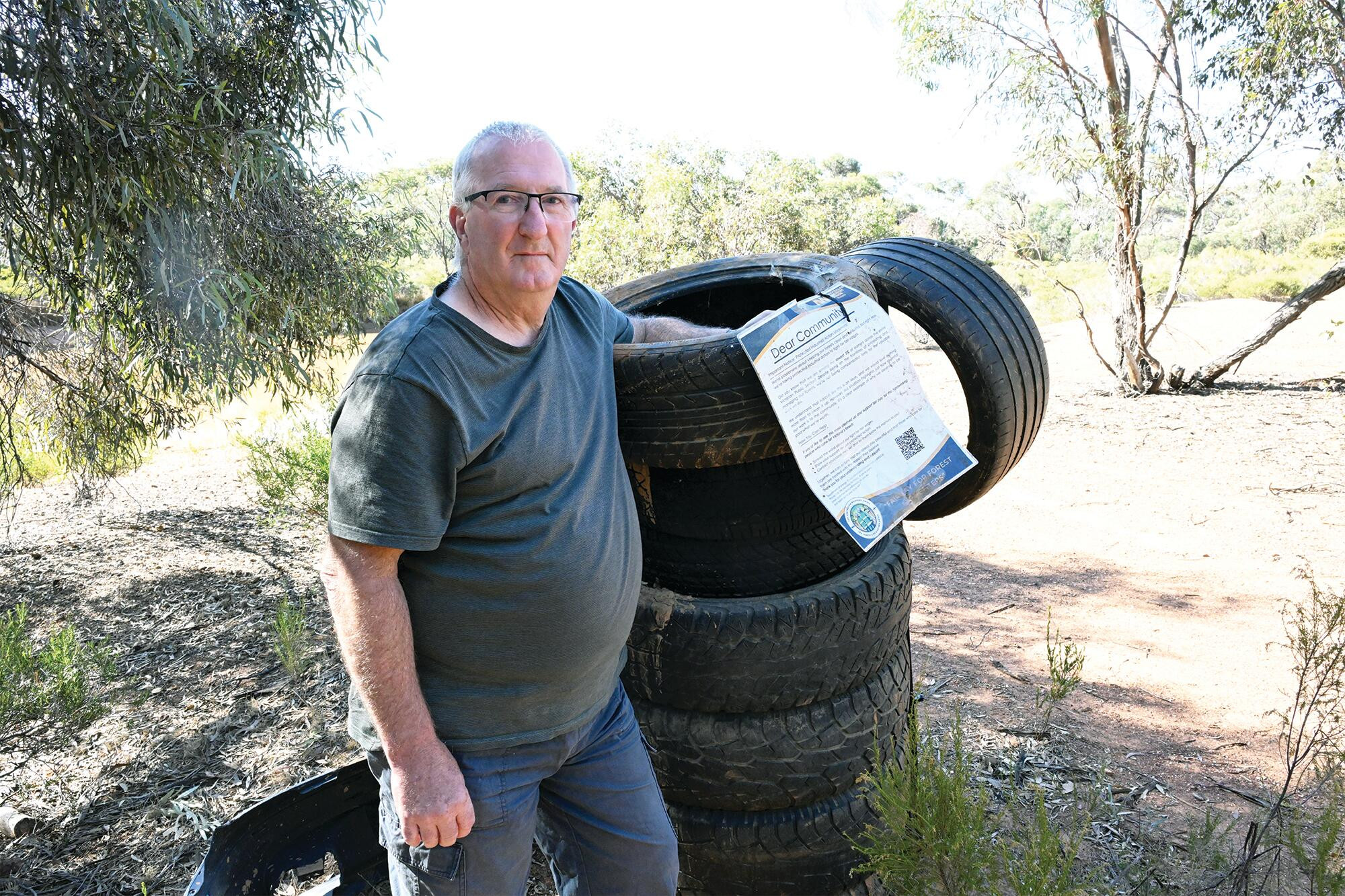 Darryl Arnott ... disappointed dumped rubbish is not being removed. LH PHOTO