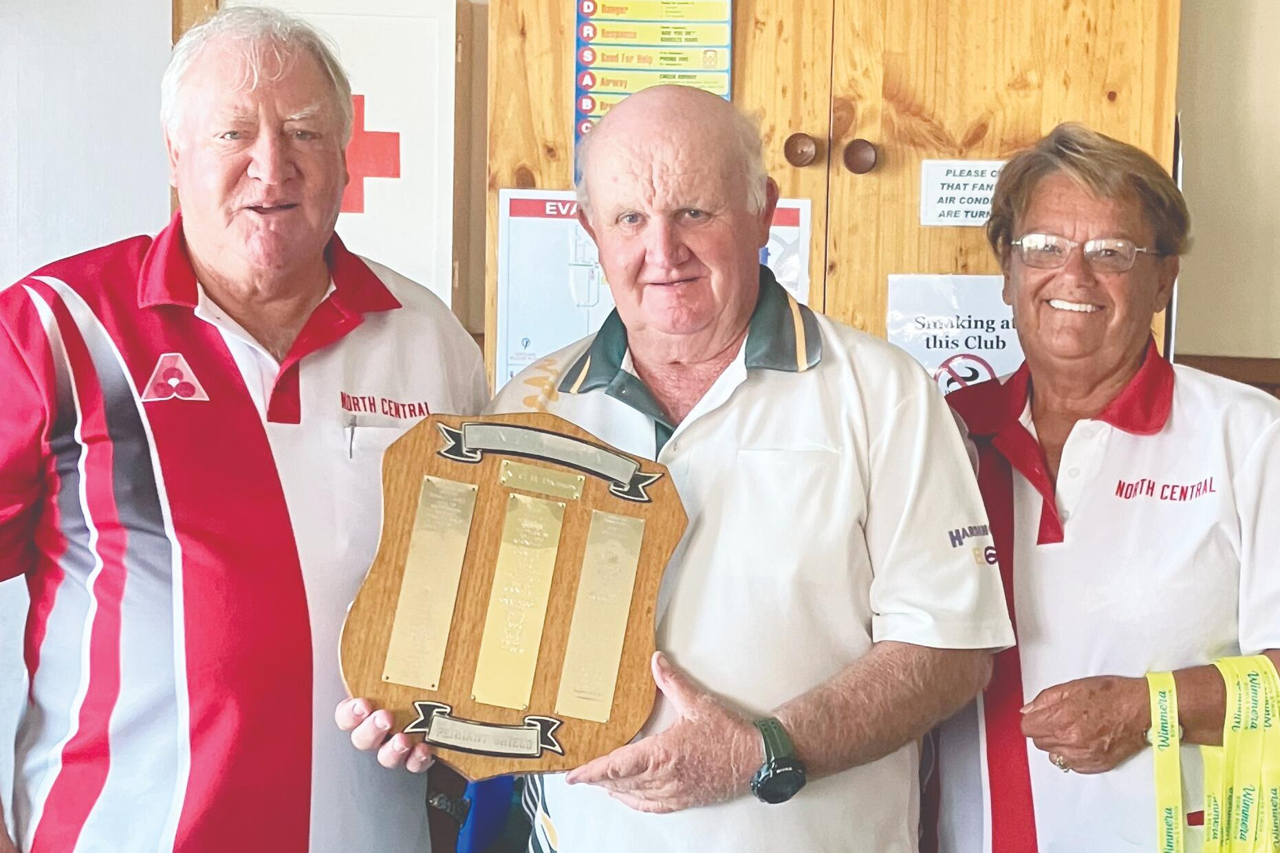 North Central midweek premiers - Donald skipper Peter Herbert (centre) receives the premiership shield from North Central playing area’s Lance Standfield and Sandra Steel