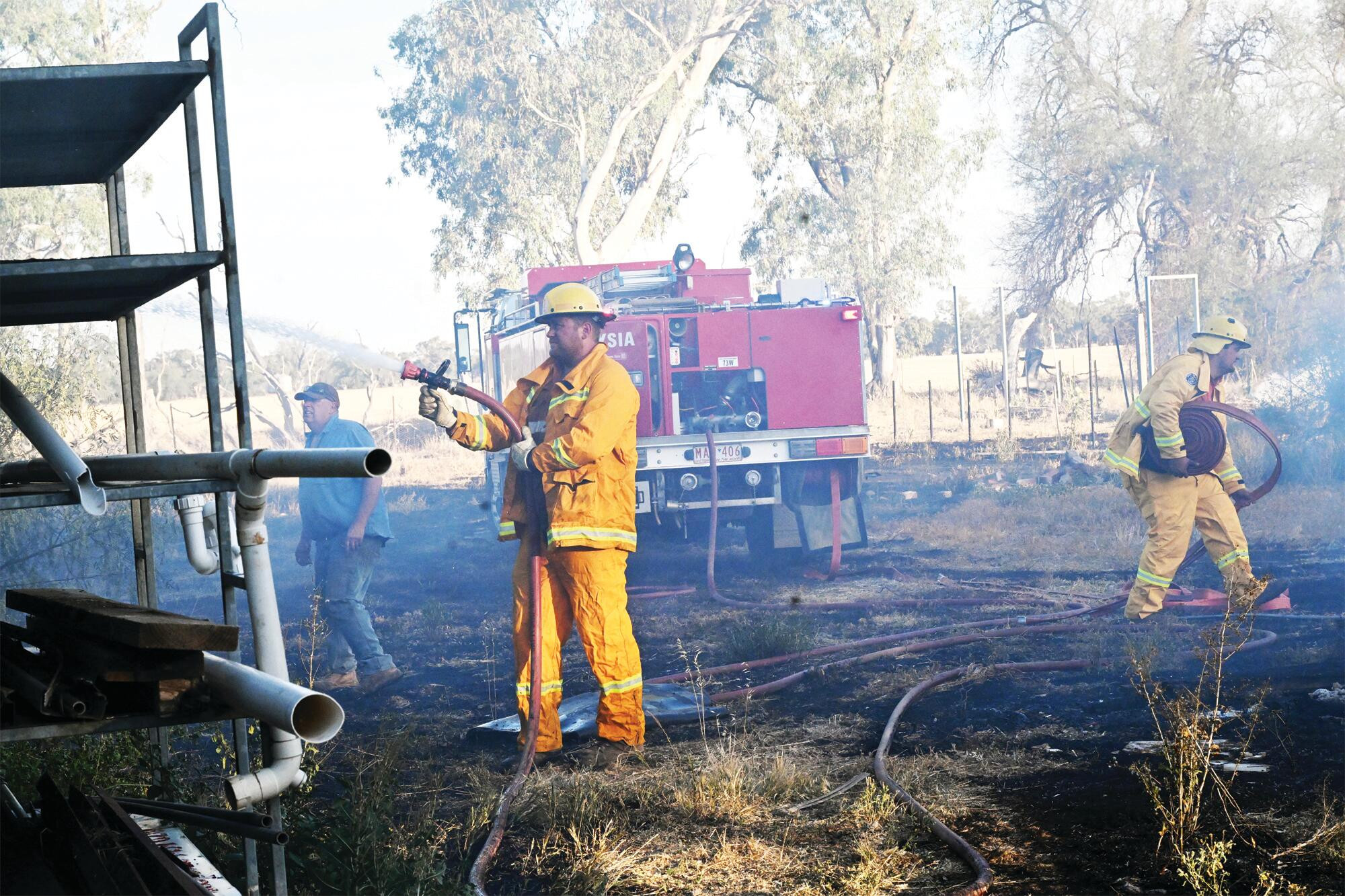 The Mysia brigade crew tackle Friday’s fire. LH PHOTO