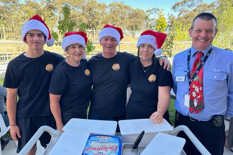 The team from Cafe 3517 with IDHS director of nursing Mark Nally
