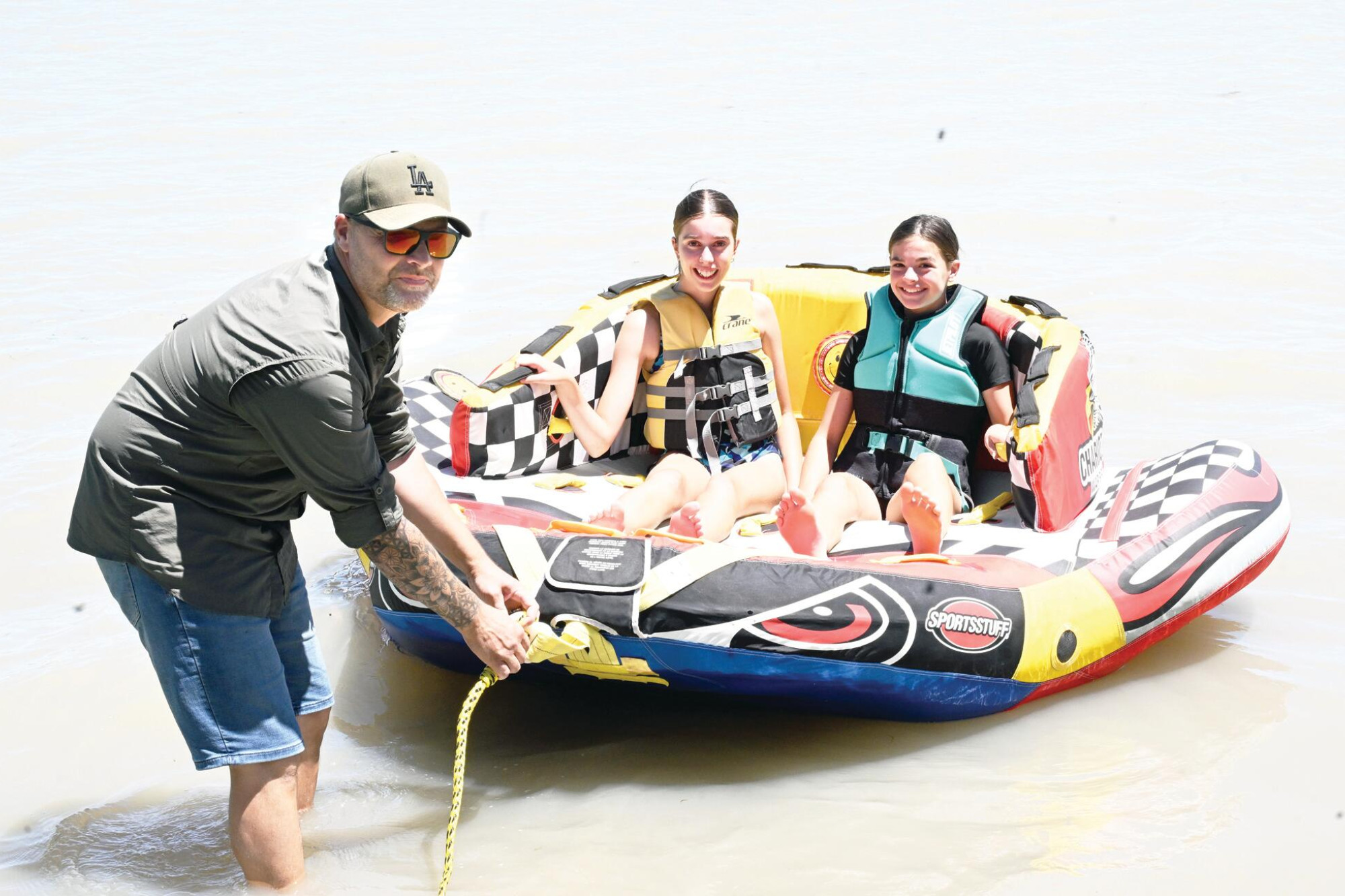 Lance Bennett, Chelsey Bennett and Lily Capicchiano prepare for a water spin. LH PHOTOS