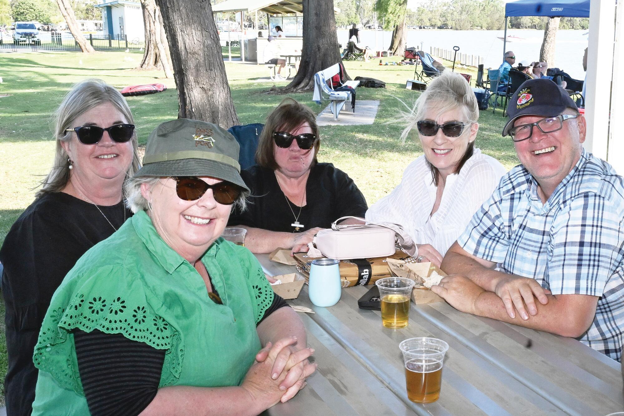 Sue Gould, Merrin Rees, Noemi Dussin, Carlene Darker and Tom Bleicher relax in Nolen’s Park