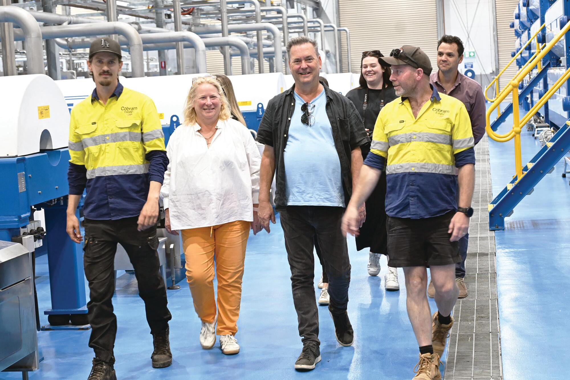 Dale Smythe (right) leads Kate Lorimer-Ward and Simon Marnie on their inspection at Cobram Estate’s Boort processing plant on Friday. LH PHOTO
