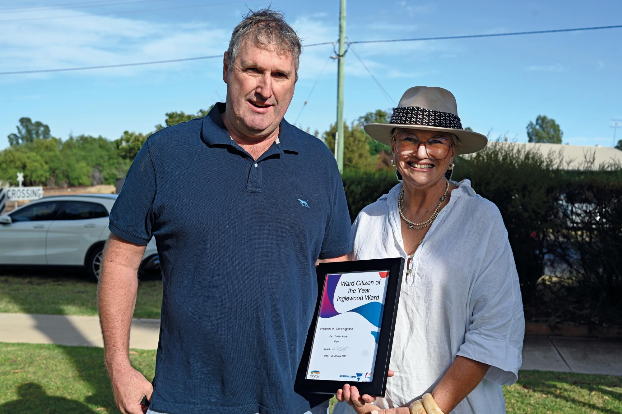 Tim Ferguson receives the Inglewood Ward citizen of the year from Cr Miki Wilson