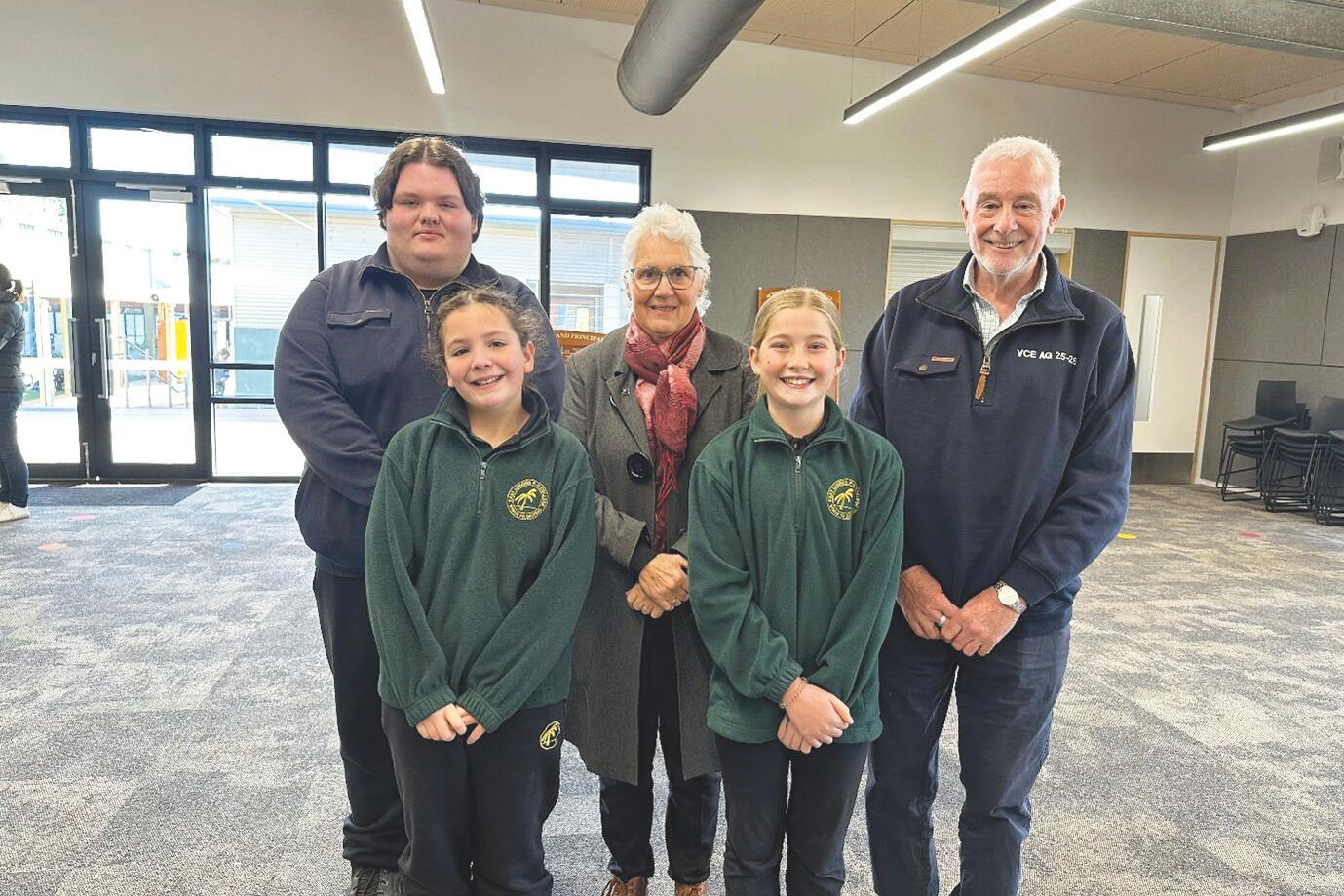 Public speaking winners Ilah Penny and Emily Lister (front) with judges Nathan Collins, Sue Bennett and Phillip Britton