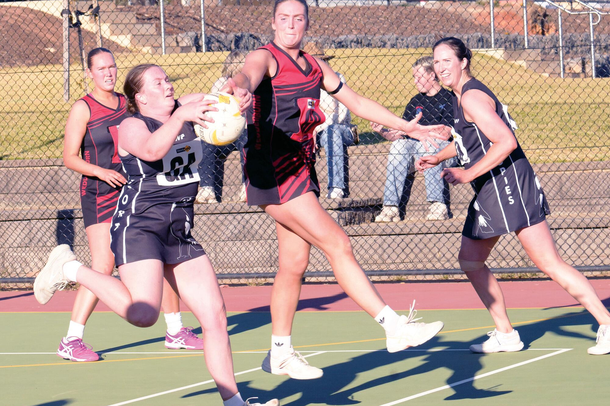 Georgia Weaver battles Wedderburn’s Maddi Postle in Saturday’s epic encounter. LH PHOTO