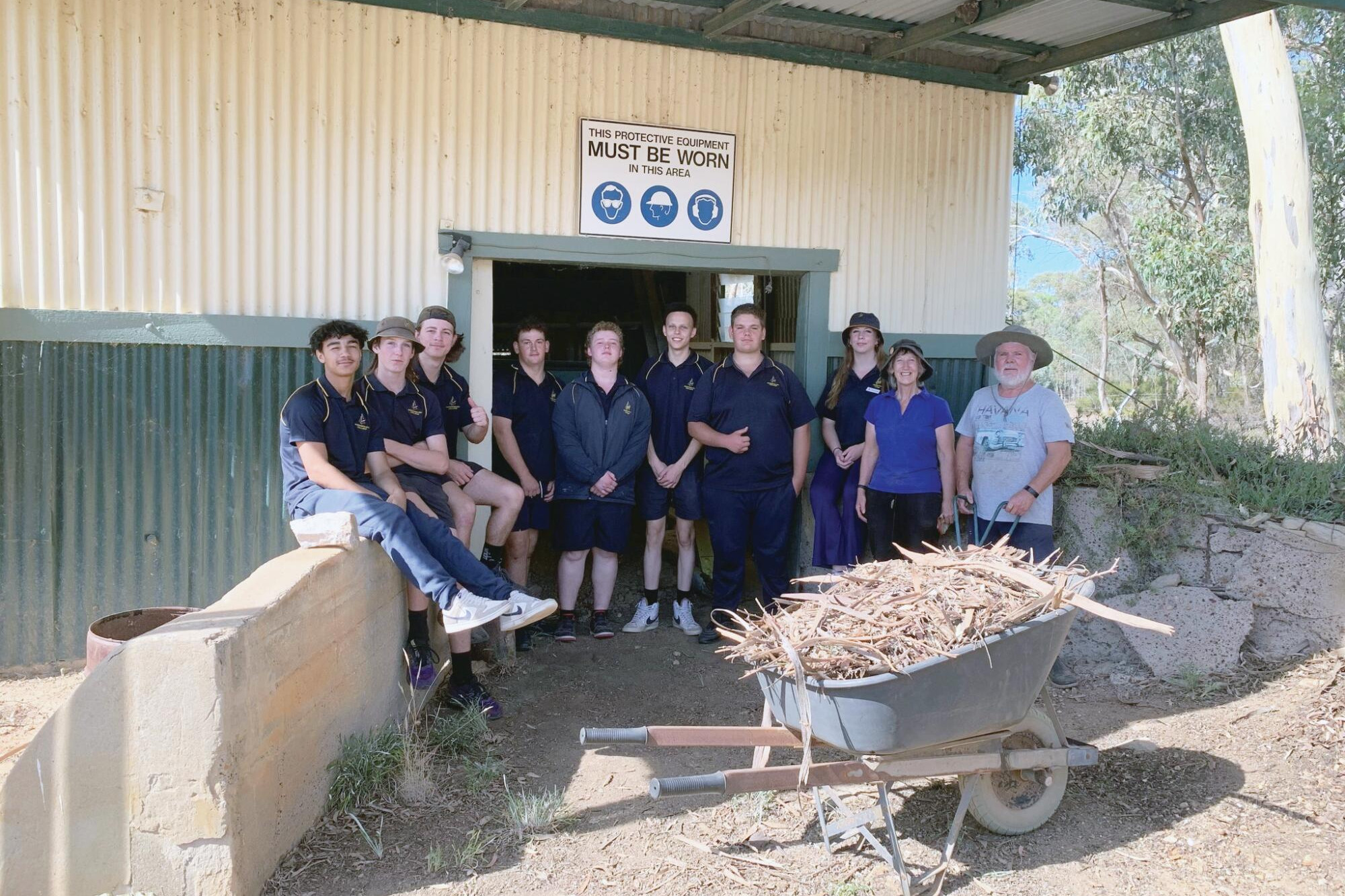 Vocational Major students from Wedderburn College help with preparations at Hard Hill