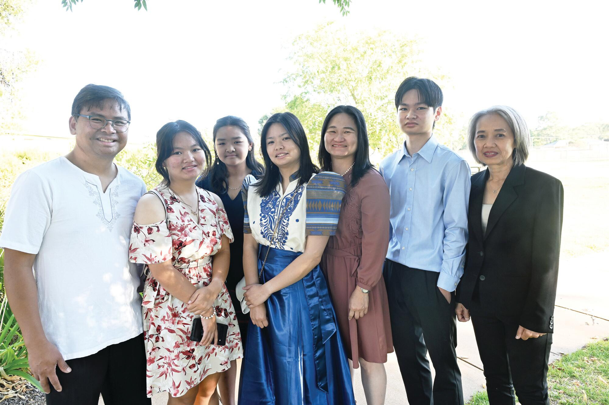 New citizens Jobrian, Jonie, Rachel, Sharnia, Helena and Ivan Trinidad and Malinee Unprasoet after Tuesday’s ceremony in Wedderburn. LH PHOTO