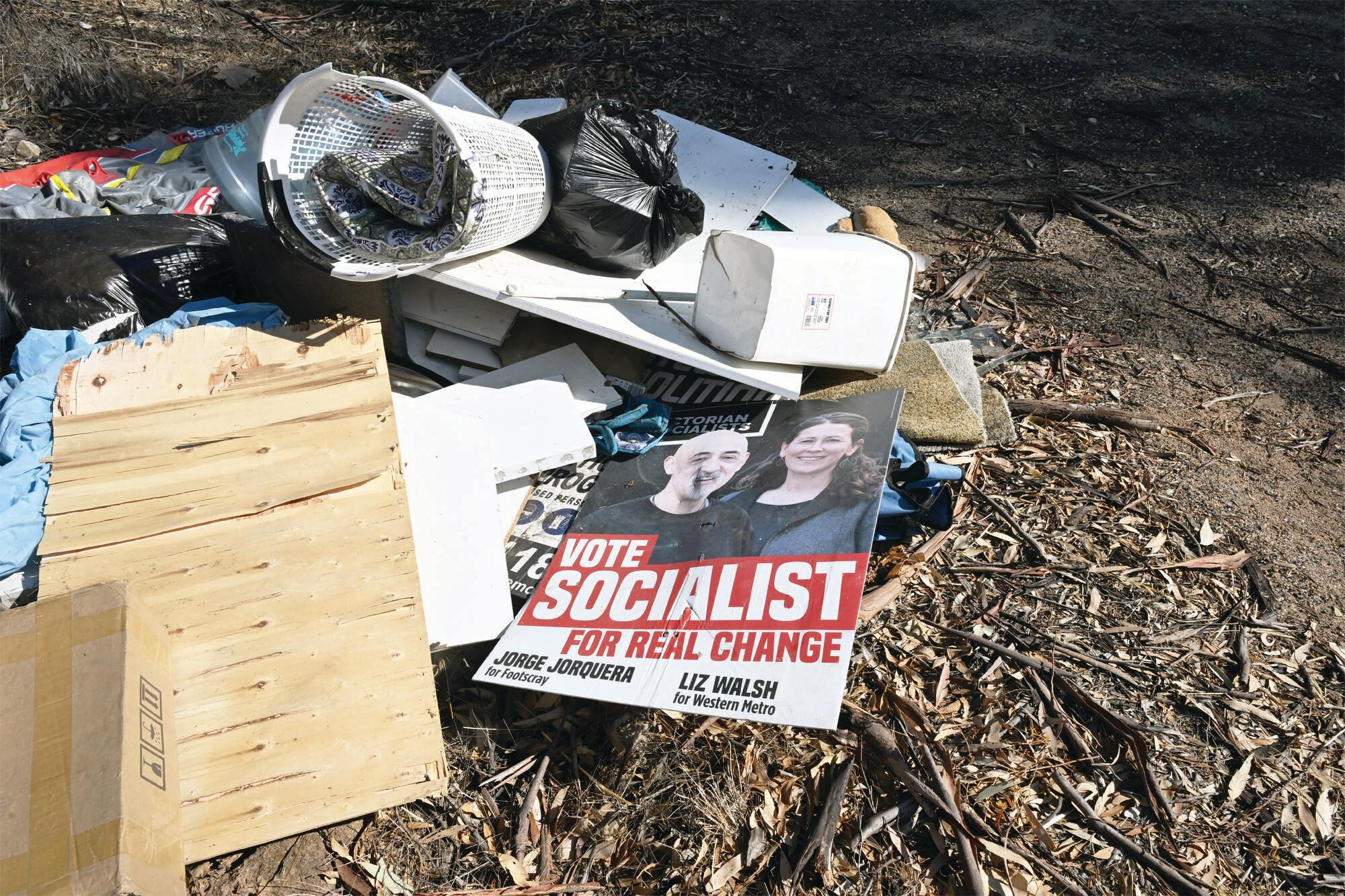 Dumped beside the Calder Highway ... boxes, rubbish and old election posters. LH PHOTO