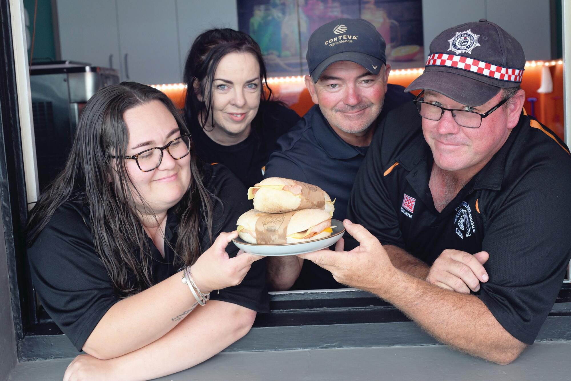 Breakfasts raising money for the Good Friday Appeal ... Tarryn Smith, Brooke Smyth, Dave Smyth and Shane Maxwell. LH PHOTO