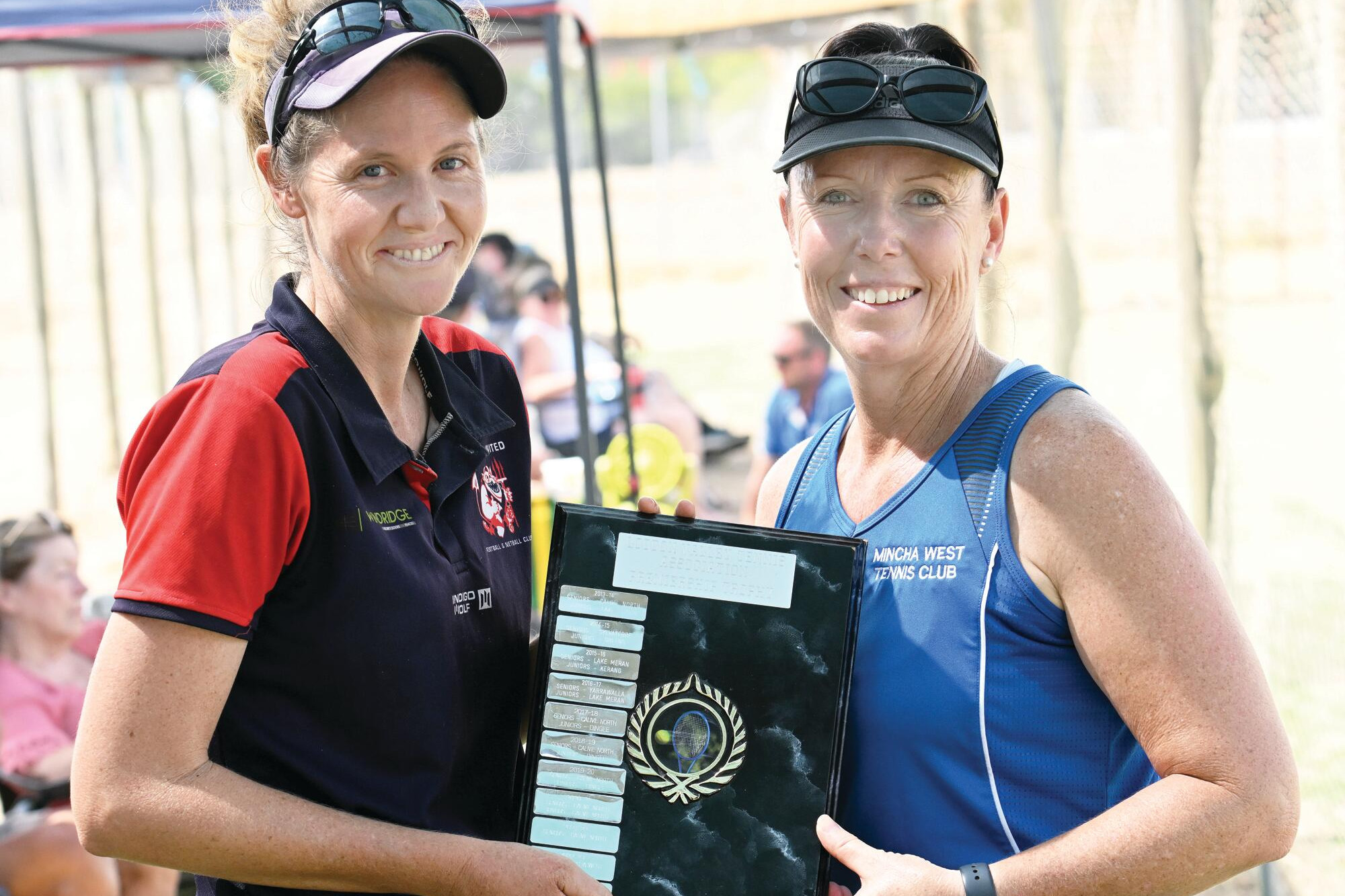 Victorious Calivil North skipper Michelle Balic is congratulated by Mincha West's Jeannie Wagnert