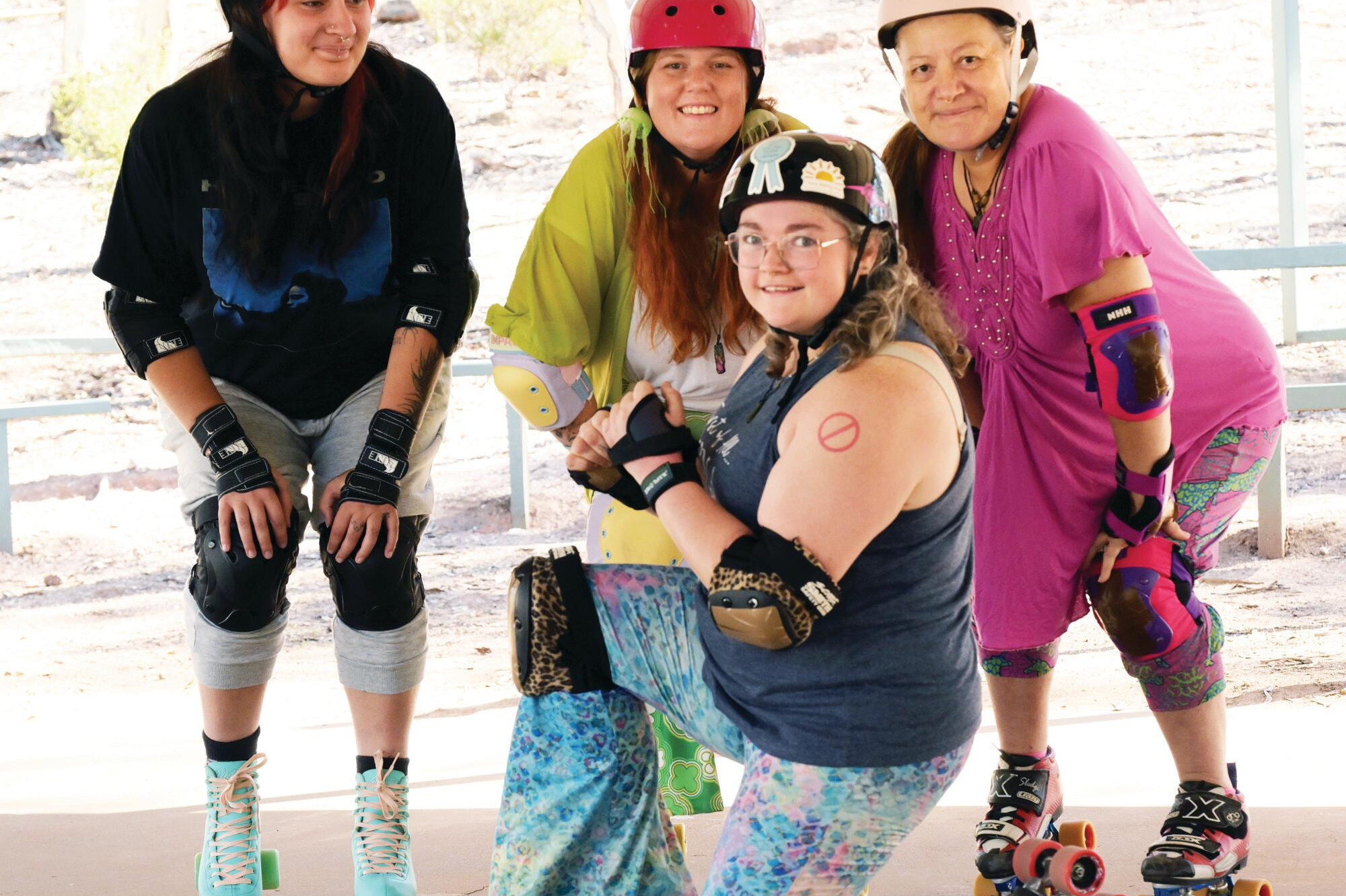 Alyssa Fisher, Evie Derks and Valerie Friend get skating tips from Tiffany Playdell. LH PHOTO