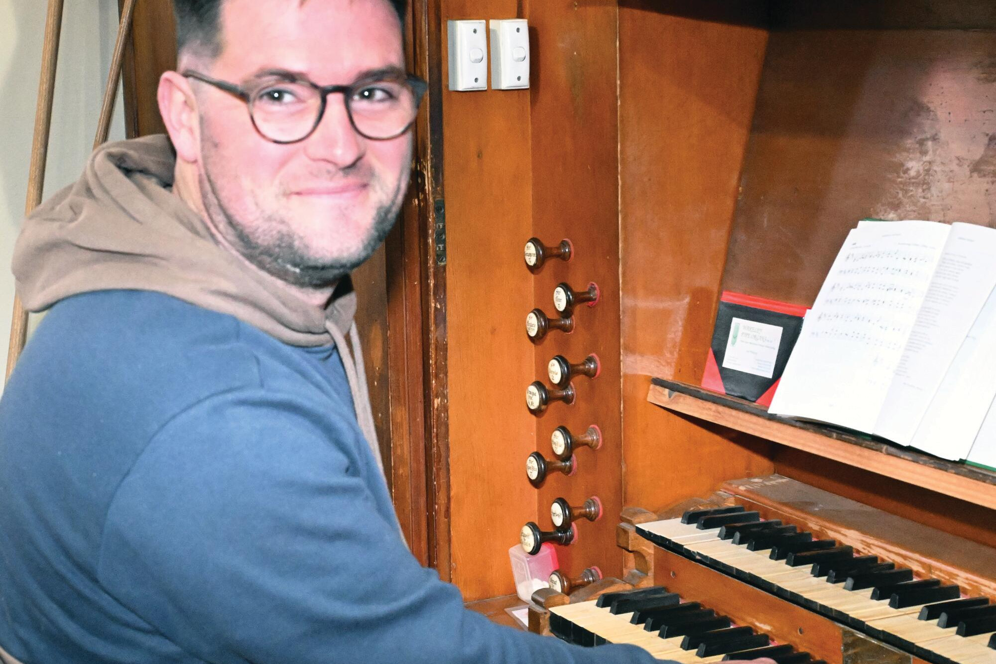 Daniel Clarke plays the historic Fincham organ at St Augustine’s 150th anniversary service last year. LH PHOTO